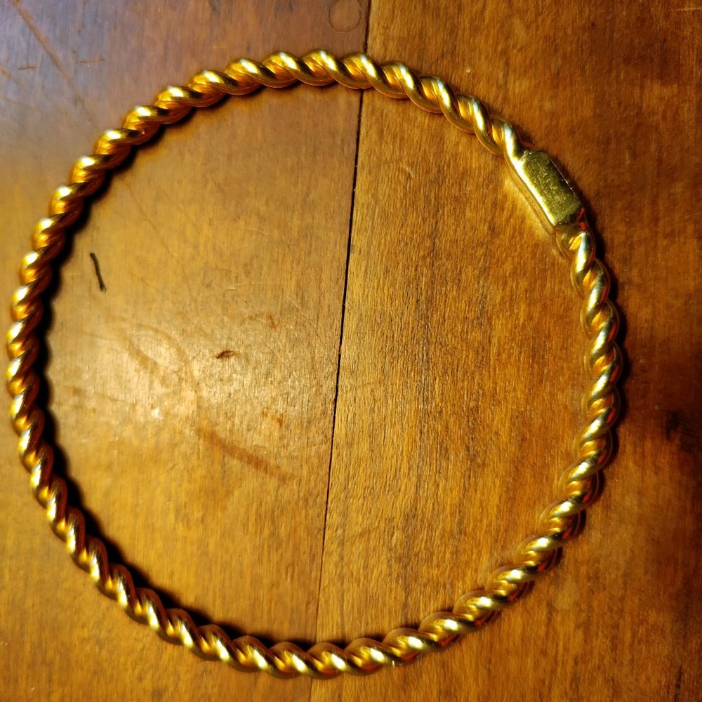 Coach gold-tone twisted bangle